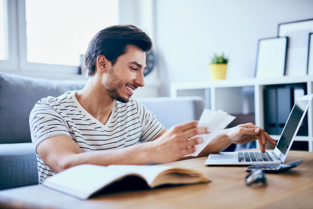 Young man using laptop