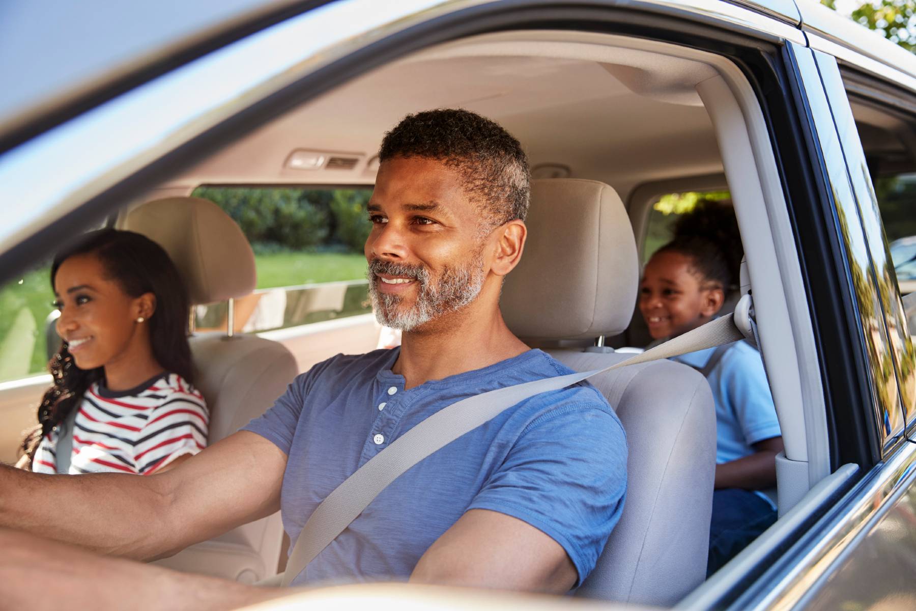 Dad in car with teen daughter