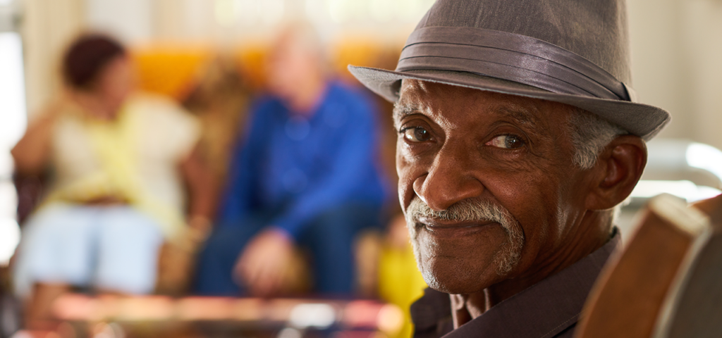 Older African American man with hat