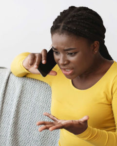 Upset woman on phone