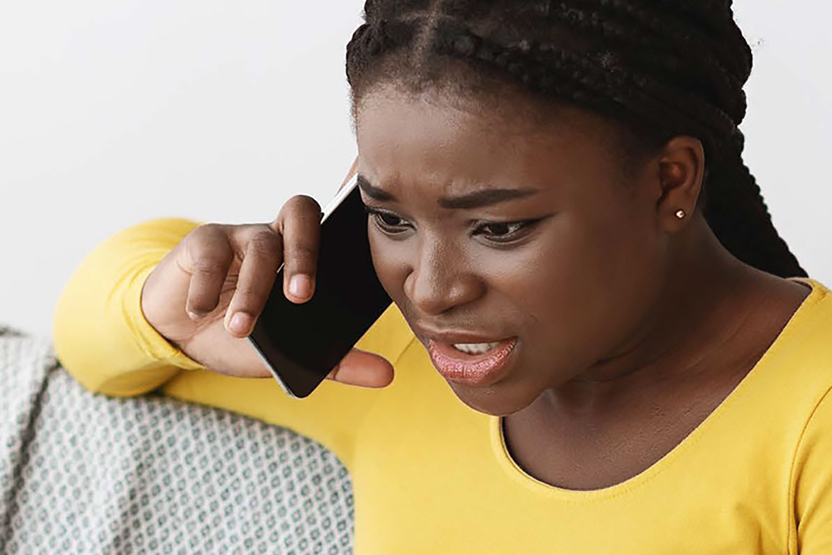 Frustrated woman talking on the phone