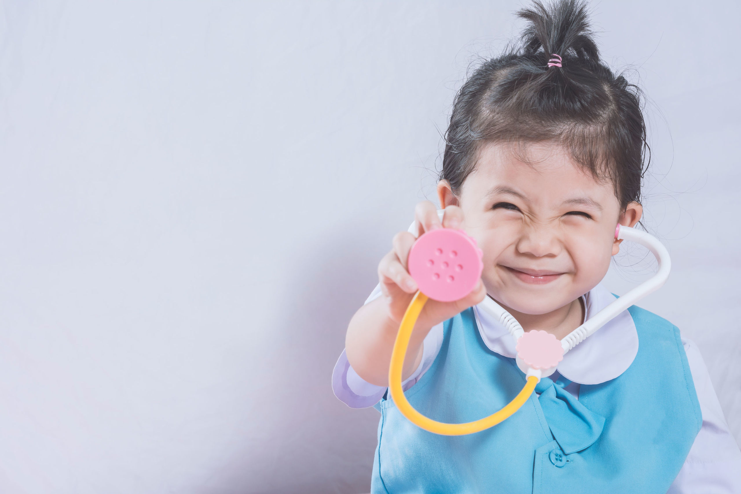 Girl playing doctor