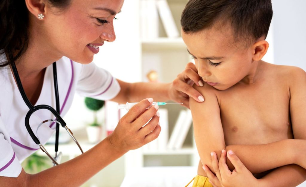 Boy receiving shot