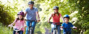 Family riding bikes