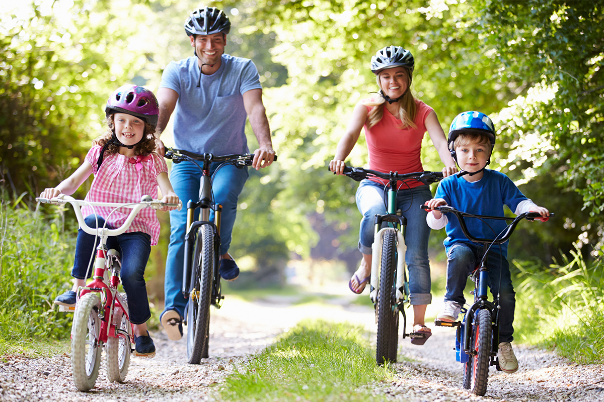 Family riding bikes