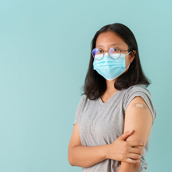 Girl with vaccinated arm