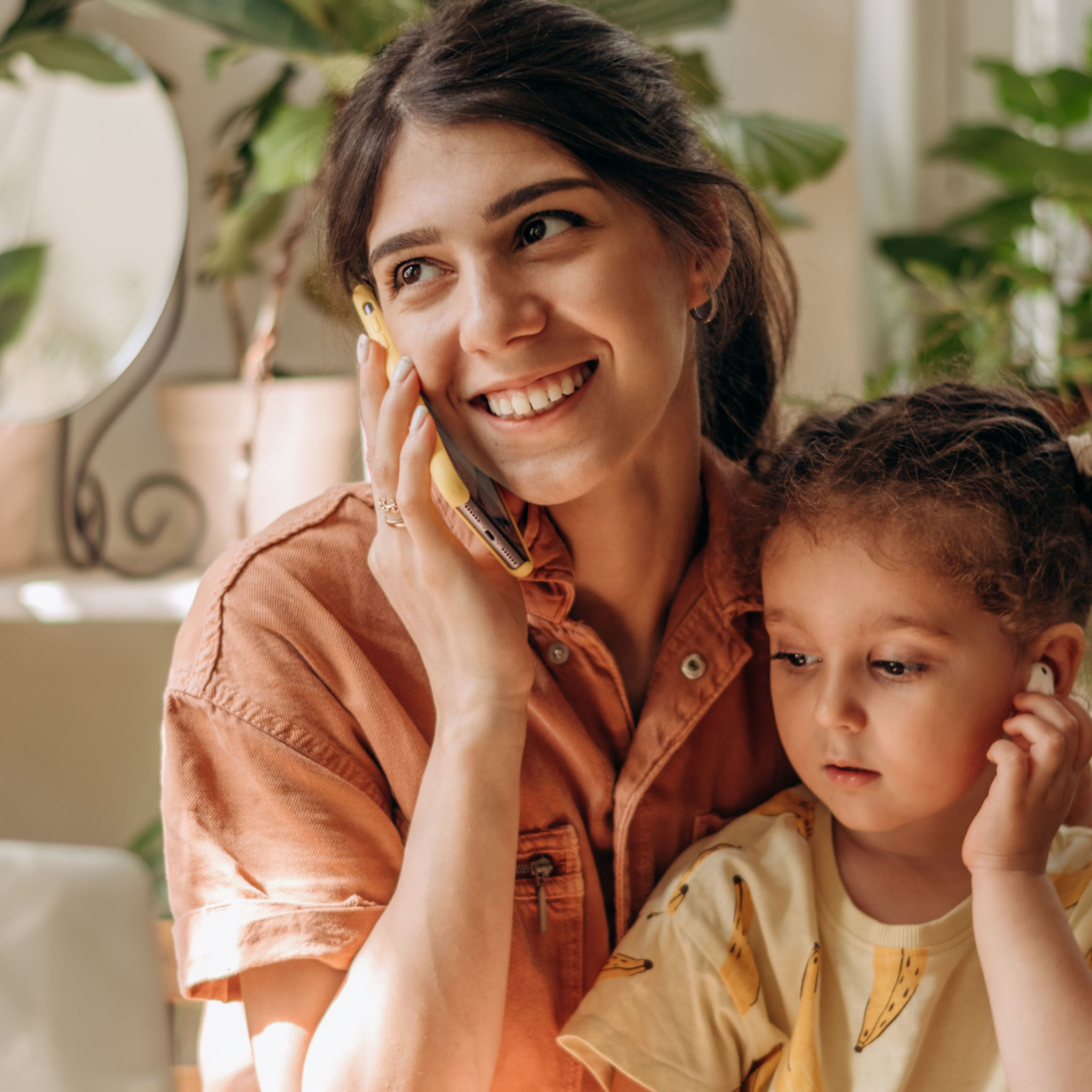 Working mom and child on the phone